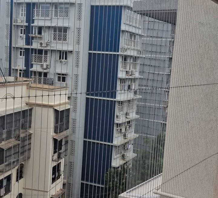 Residential buildings representing professional bird net installation in Pune