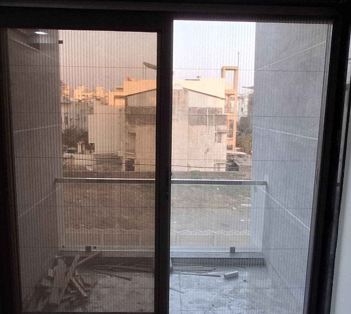 Modern residential building representing balcony and window safety services in Pune